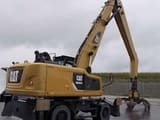 2015 Caterpillar MH3024 material handler, rear three-quarter view