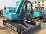 2023 Kobelco SK75 mini excavator, side view