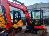 2021 Kubota KX155-5 mini excavator, front three-quarter view