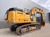 2017 Caterpillar 352F crawler excavator, rear three-quarter view