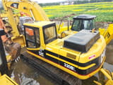 2019 Caterpillar 320BL crawler excavator, rear three-quarter view