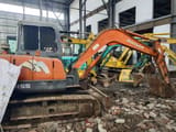 2015 Doosan DH55 mini excavator, side view