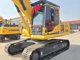 2024 Komatsu PC210 crawler excavator, front three-quarter view