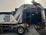 2005 CASE WX165 wheel excavator, side view