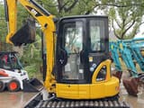 2023 Caterpillar 303.5 C CR mini excavator, side profile view