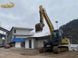 2021 XCMG XE135D crawler excavator, front three-quarter view
