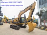 2023 Caterpillar 313D2 GC crawler excavator, side view