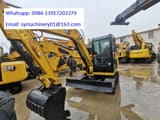 2023 Caterpillar 306E2 mini excavator front three-quarter view