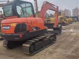 2020 Doosan DX60 crawler excavator, rear three-quarter view