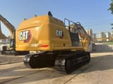 2022 Caterpillar 349 crawler excavator, rear three-quarter view