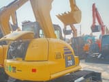 2025 Komatsu PC70 crawler excavator, rear three-quarter view