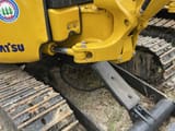 2022 Komatsu PC20MR-3 mini excavator side view of boom base and tracks