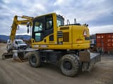 2018 Komatsu PW148-10 wheel excavator, rear three-quarter view