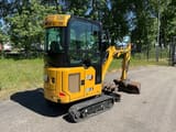 2023 Caterpillar 301.6 mini excavator, rear three-quarter view