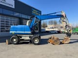 2015 Caterpillar M313D wheel excavator, side view