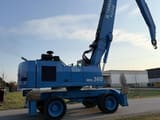 2000 Terex Fuchs MHL360 material handler, side profile view