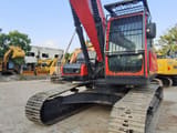 2024 Doosan DX225LC-9C crawler excavator, front three-quarter view