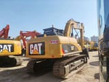2020 Caterpillar 315D crawler excavator, rear three-quarter view