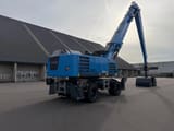 2026 Fuchs MHL360 F material handler, rear three-quarter view