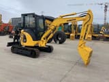 Komatsu PC35 MR mini excavator, side view