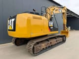 2011 Caterpillar 329ELN crawler excavator, rear three-quarter view
