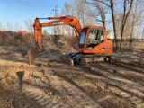2023 Doosan DH80G mini excavator, side profile view