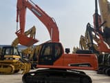 2023 Doosan DX225LCA crawler excavator side view