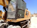 2016 Caterpillar M320F wheel excavator cab view