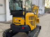 2024 Komatsu PC35 mini excavator, rear three-quarter view