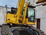 2019 Komatsu PC450-8 crawler excavator, front three-quarter view