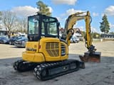 2020 Komatsu PC58MR-5E0 mini excavator, rear three-quarter view