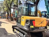 2021 Volvo EC60D mini excavator, rear three-quarter view