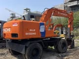 1993 Hitachi EX100WD wheel excavator, rear three-quarter view