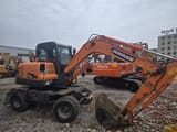 2018 Doosan DX60W wheel excavator, side view