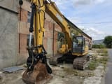 2005 John Deere 200C LC crawler excavator, front three-quarter view