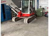 2016 Takeuchi TB260 mini excavator, front three-quarter view