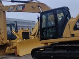 2019 Caterpillar 320GC crawler excavator side view