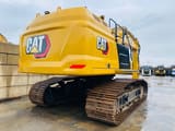 2023 Caterpillar 352 crawler excavator, rear three-quarter view