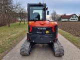 2024 Kubota U56-5 mini excavator, rear view