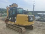 2020 Caterpillar 308E2 excavator, rear three-quarter view