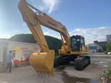 2023 Komatsu PC300 crawler excavator, front three-quarter view