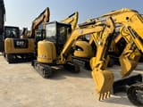 2023 Caterpillar 303.5E mini excavator, side view