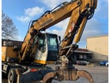 2008 Liebherr A316 material handler, front three-quarter view