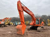 2017 Doosan DX220LC crawler excavator, front three-quarter view