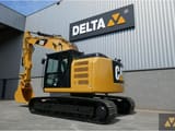 2015 Caterpillar 320EL crawler excavator, rear three-quarter view