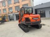 2018 Doosan DX60 crawler excavator rear three-quarter view