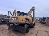 2012 Caterpillar M322D MH material handler rear view