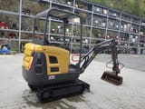2015 Volvo EC15C mini excavator, rear three-quarter view