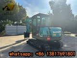 2023 Sunward SWE60E mini excavator, rear three-quarter view