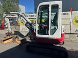 2007 Takeuchi TB138 FR mini excavator, side view